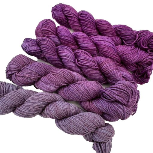 Amethyst Dream gradient yarn pack transitioning from light violet to rich purple.